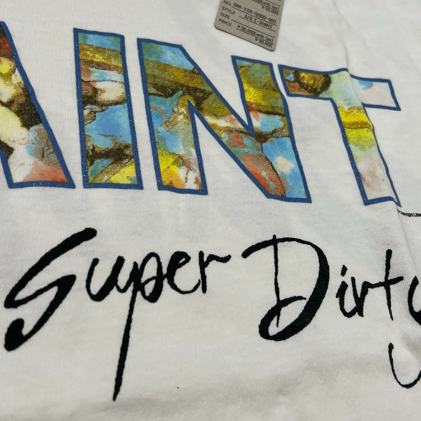 SAINT Mxxxxxx SS TEE/SUPER DIRTY/WHT oil painting SAINT SUPER DIRTY slogan TEE off-white S-XL Made of original OE yarn tube weaving without side seams to distinguish the split fabrics original consistent VINTAGE label/little angel anti-counterfeiting label top printing technology highly restored original details